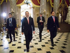 Boehner walks to his office after passage of spending bill on the House floor at the U.S. Capitol in Washington